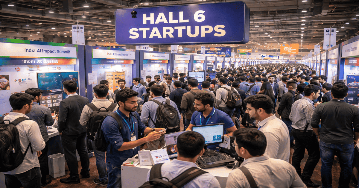Startup founder demonstrating a multilingual voice AI agent at a Hall 6 pod during India AI Impact Summit 2026, highlighting conversational voice workflows and Indian language adoption